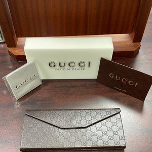 Brand new Gucci Triangle folding med size case